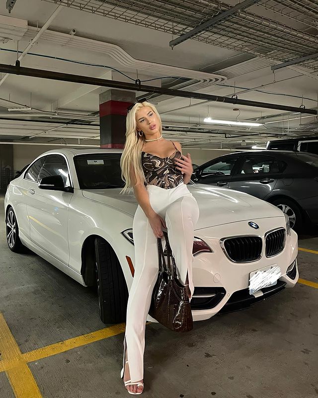 Cirena Wilson with her brand new BMW M235i.